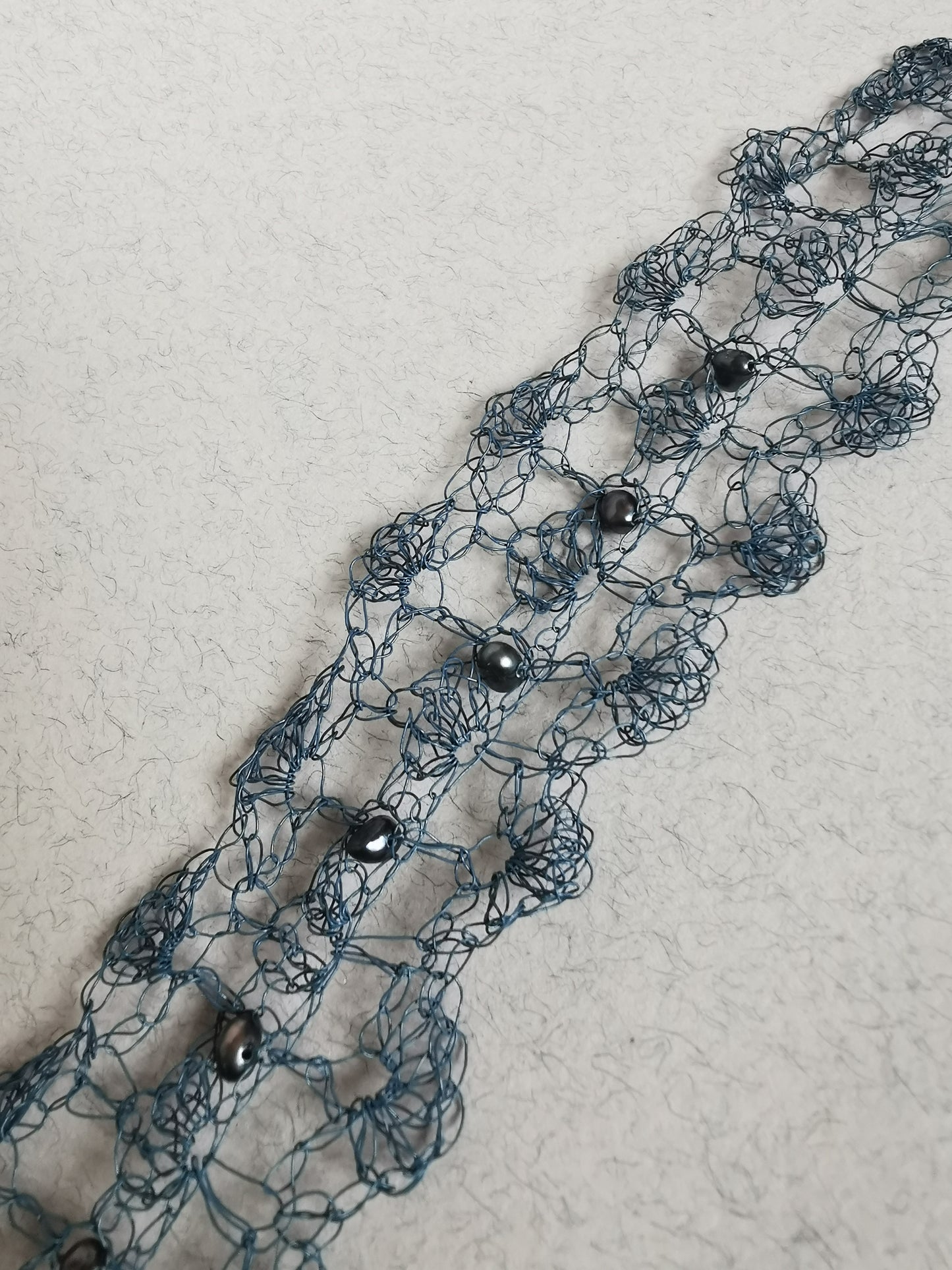 Opaque blue copper wire bracelet with Freshwater Pearls