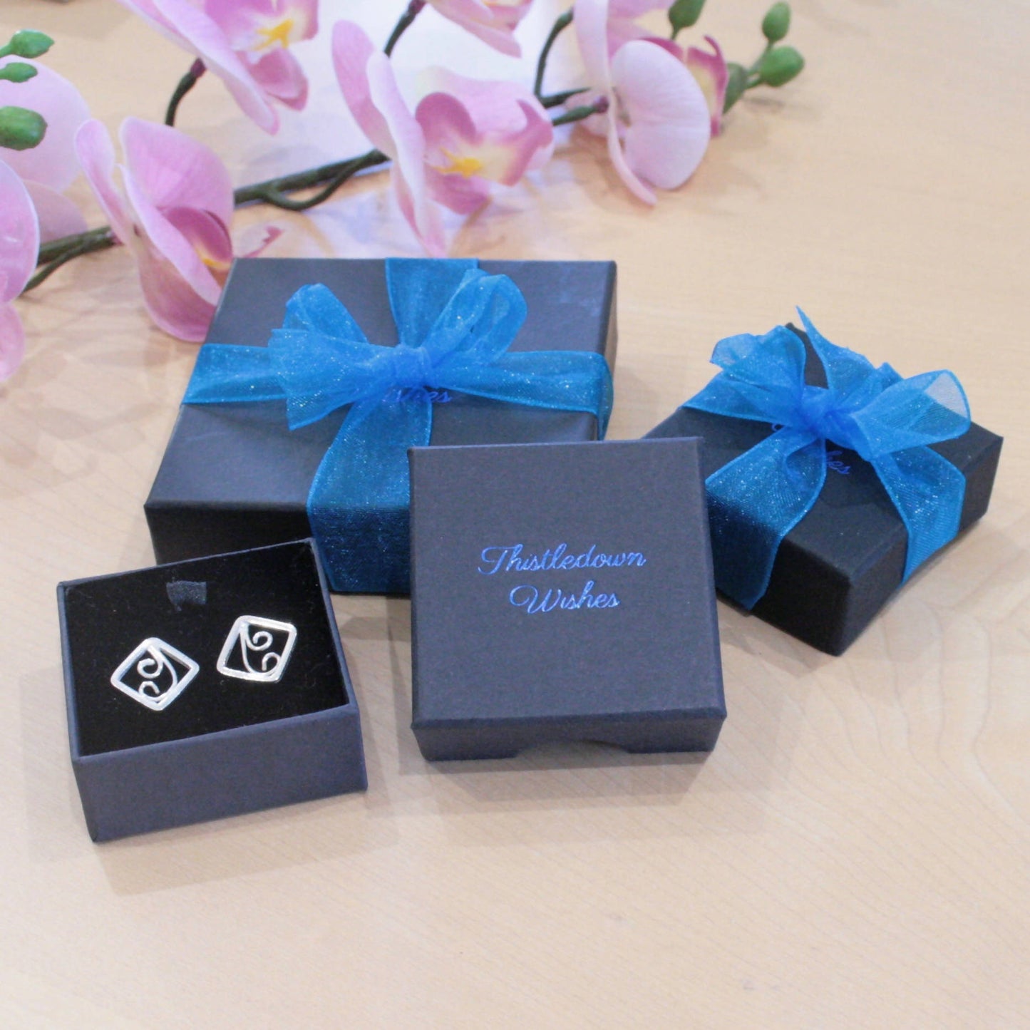 Sterling silver charm bracelet with turquoise gemstone