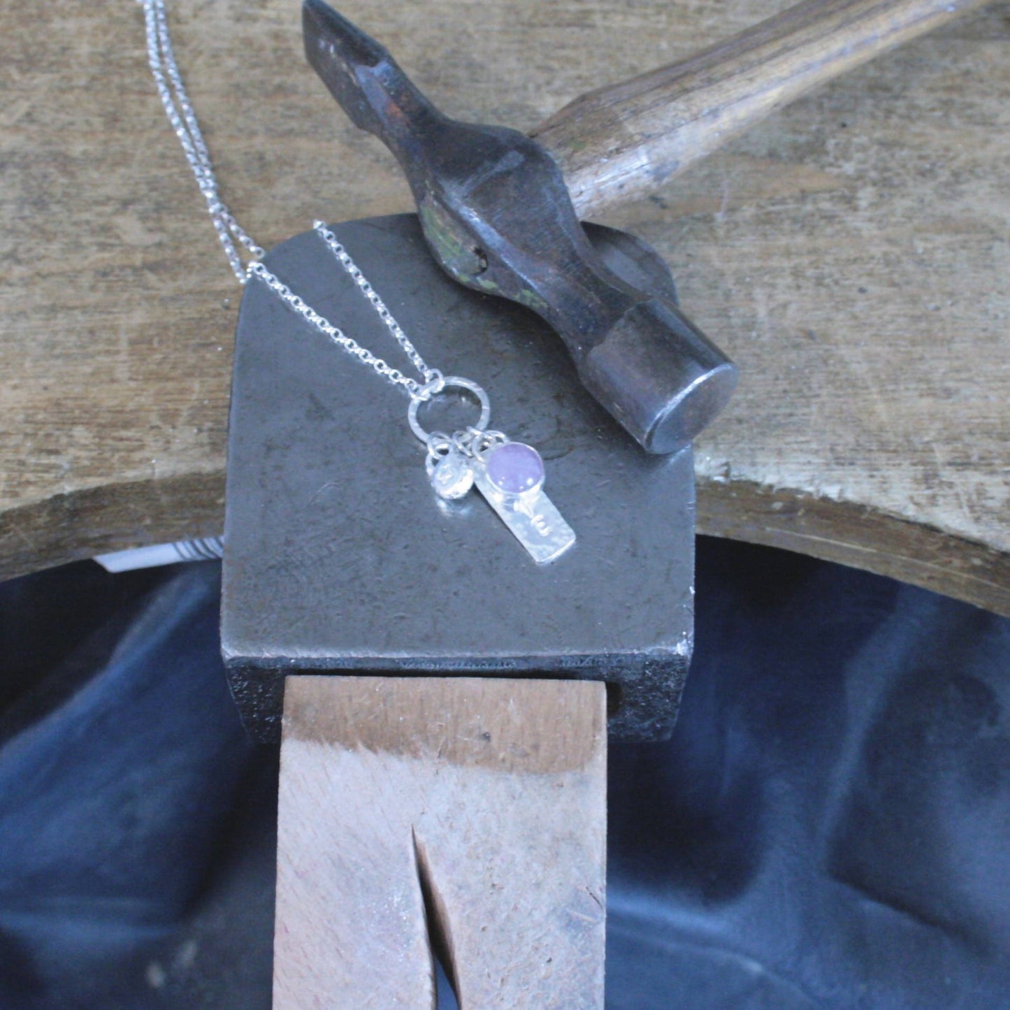 Handmade sterling silver charm necklace with lavender amethyst