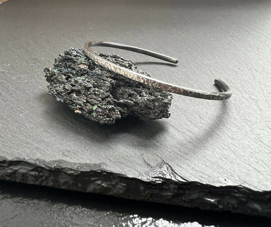 Hammered silver men’s bracelet.