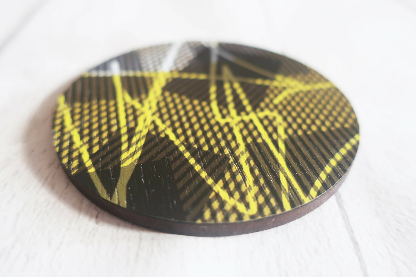Large statement graphic brooch, yellow and black printed pin
