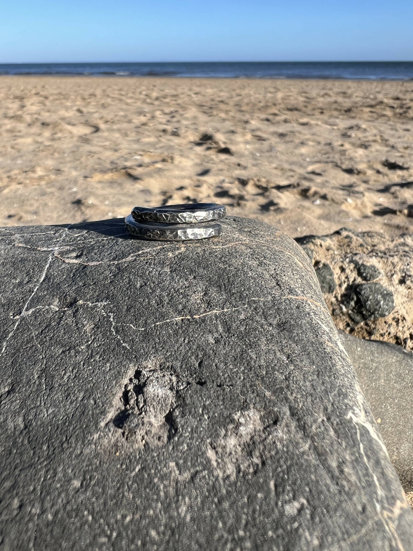 Hammered sterling silver men’s band.