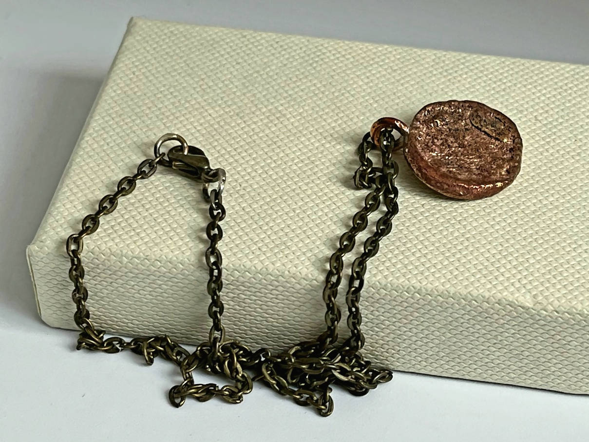 Yellow bronze spiral small pendant