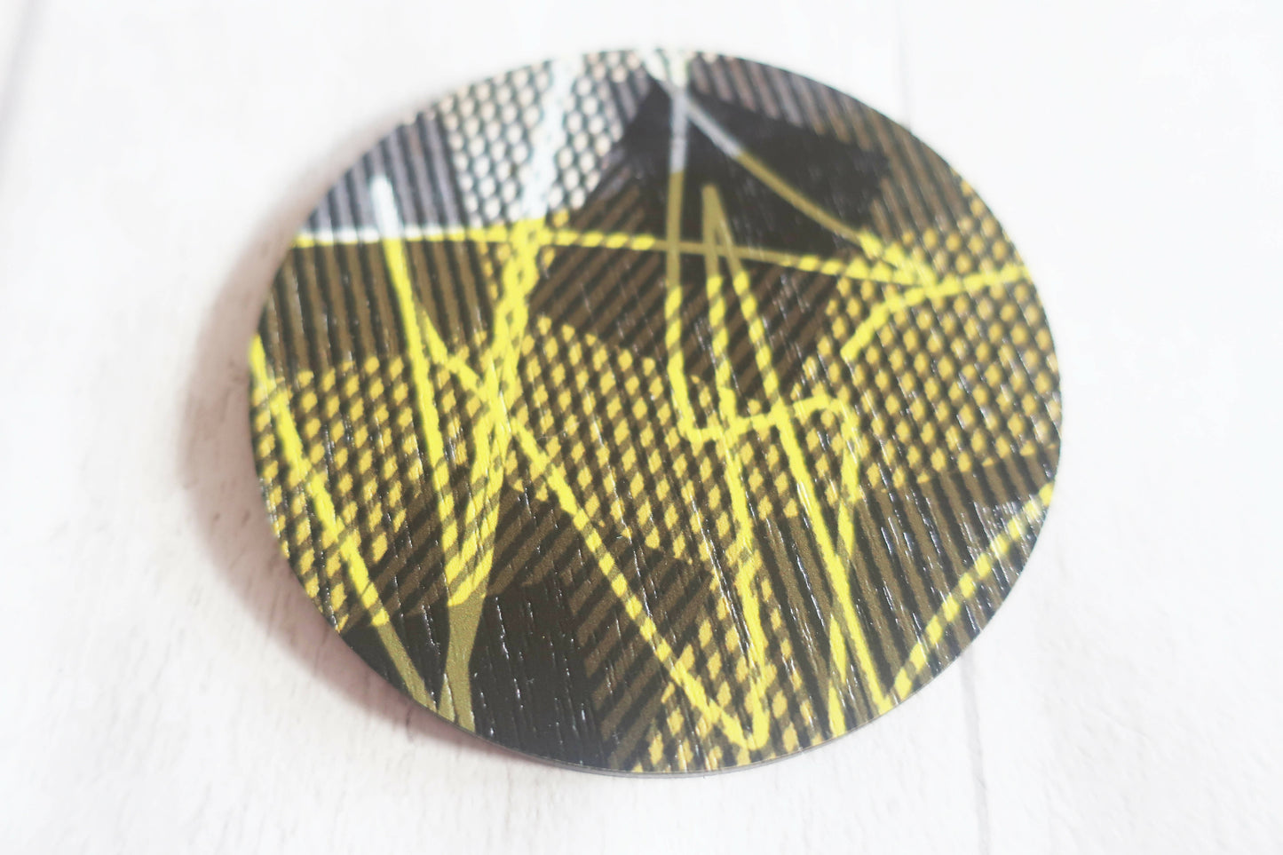 Large statement graphic brooch, yellow and black printed pin