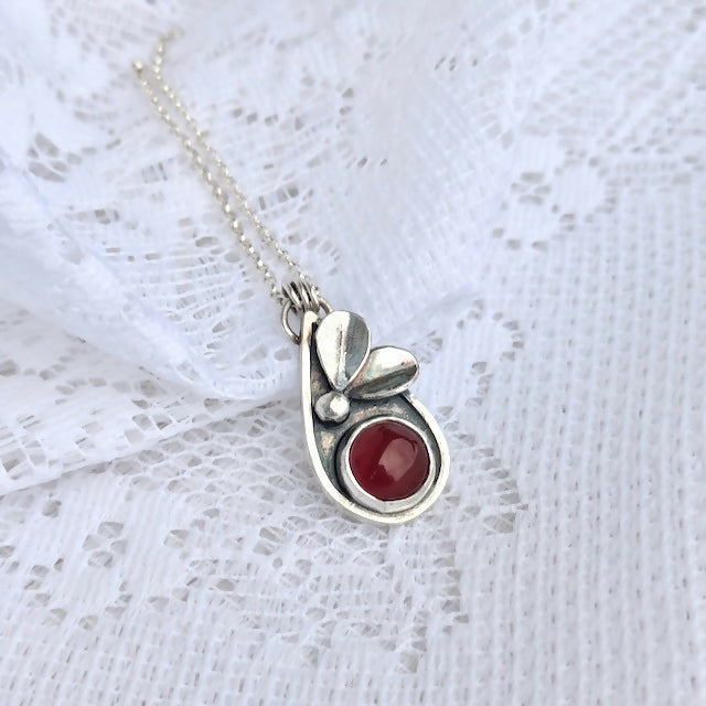 Sterling silver botanical necklace with carnelian gemstone