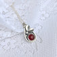 Sterling silver botanical necklace with carnelian gemstone