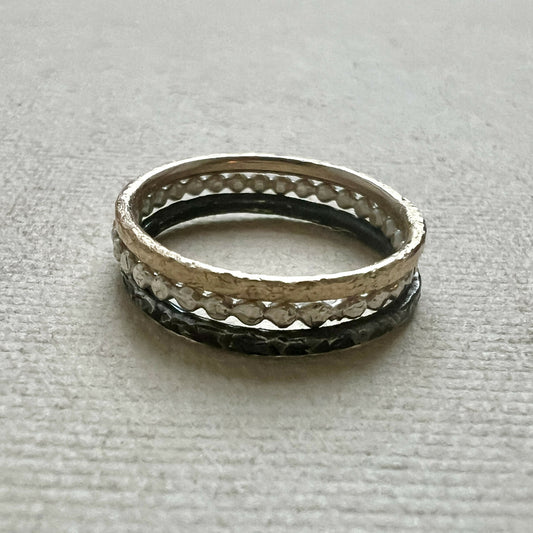 Set of three stacking rings 9ct gold, sterling silver