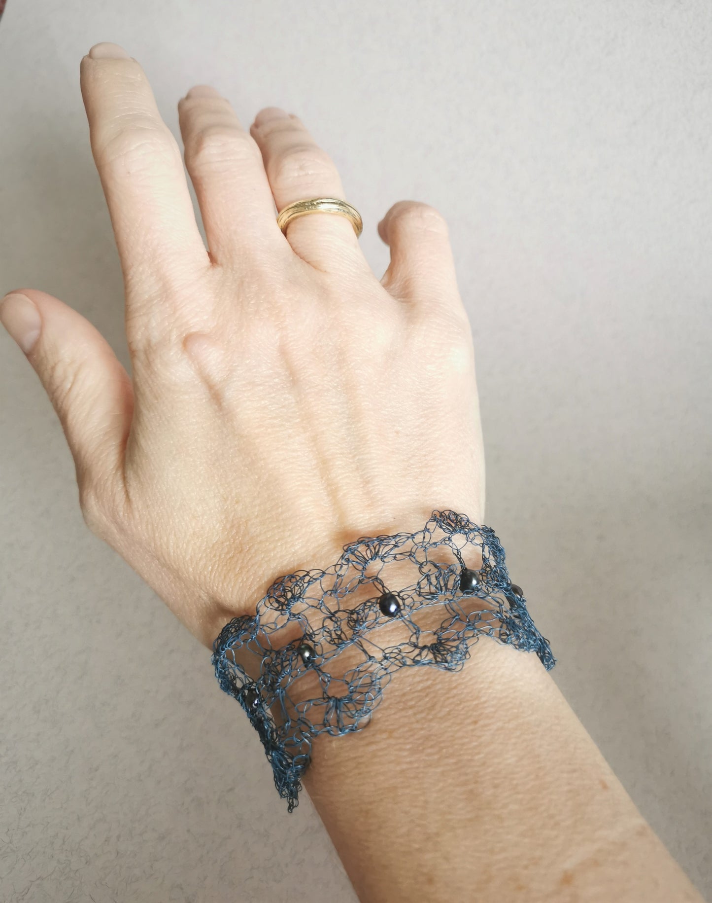 Opaque blue copper wire bracelet with Freshwater Pearls