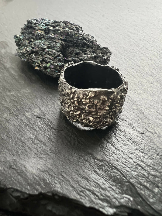 Wide band silver brutalist men’s ring.