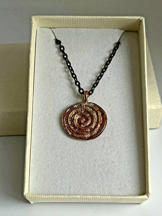 Yellow bronze spiral small pendant