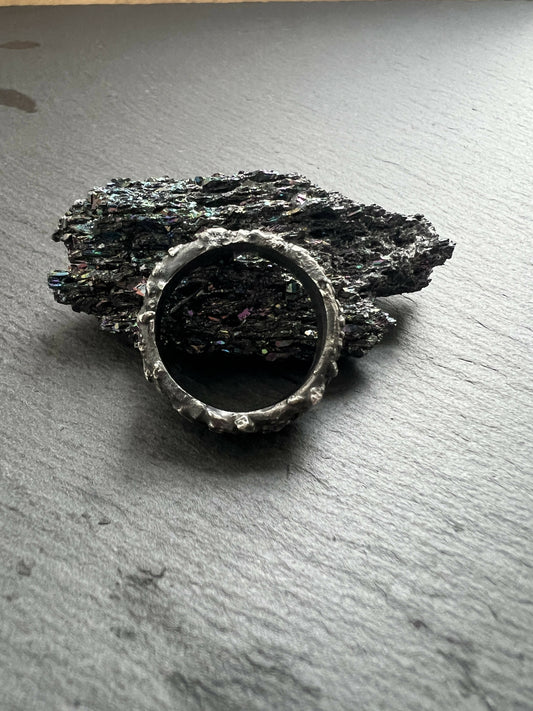 Silver brutalist men’s ring.