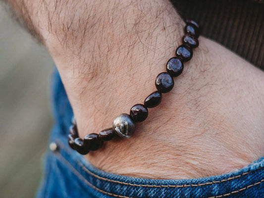 Fehu silver rune bracelet with garnets.