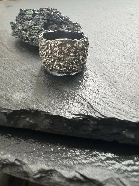 Wide band silver brutalist men’s ring.
