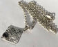 Fine silver pendant with garnet