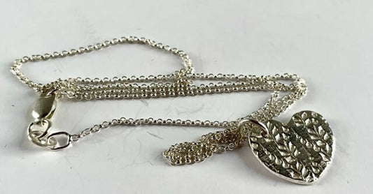 Fine silver heart with double sided pattern