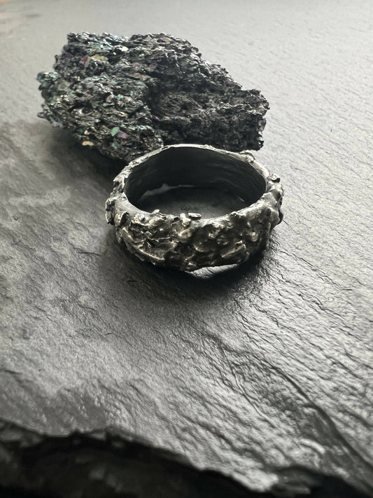 Silver brutalist men’s ring.