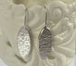 Sterling silver textured oval earrings