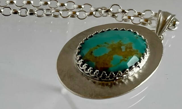 Sterling silver and spiderweb turquoise pendant