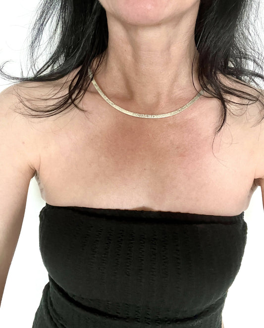 Hammered silver choker necklace.