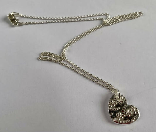 Fine silver heart pendant