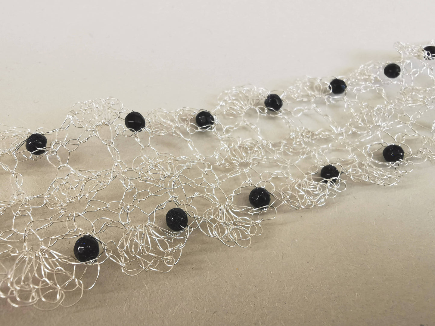 Sterling Silver wire bracelet with Blue Goldstone beads