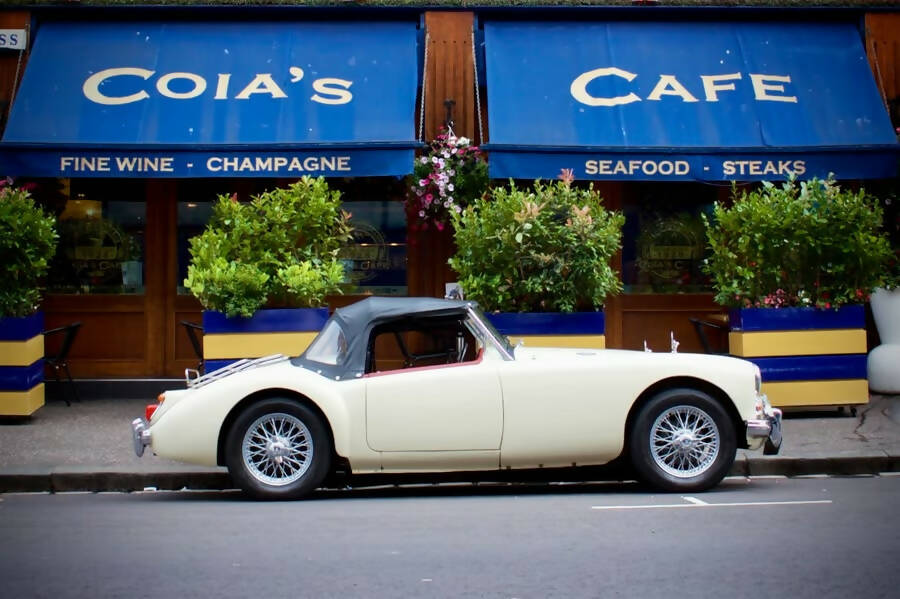 MGA at Coia’s Cafe, Glasgow Signed Mounted Print 30 x 40cm
