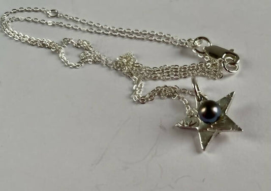 Fine silver and pearl star pendant