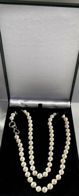 Hand knotted pearl necklace with hand made sterling silver clasp