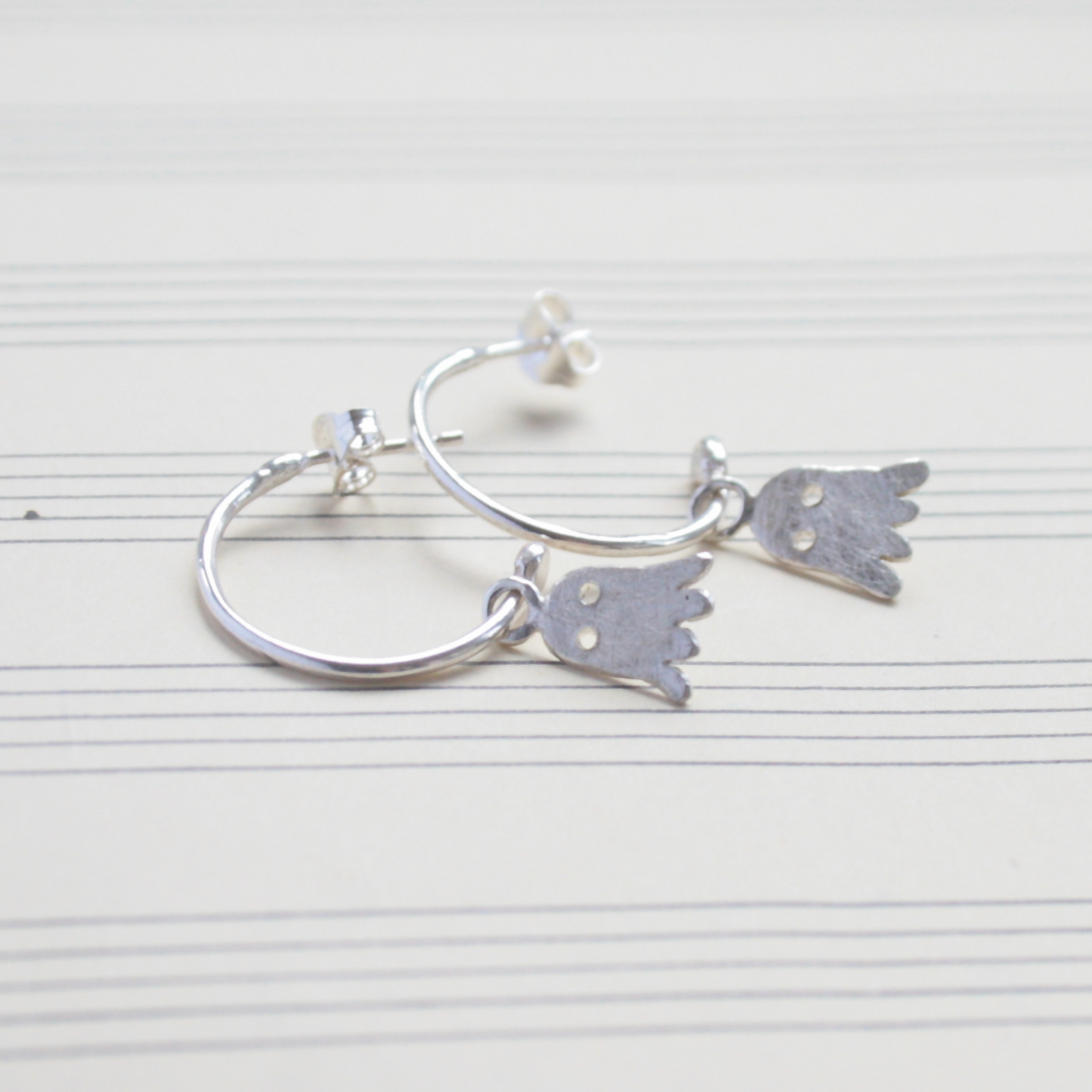 Silver ghost hoop earrings