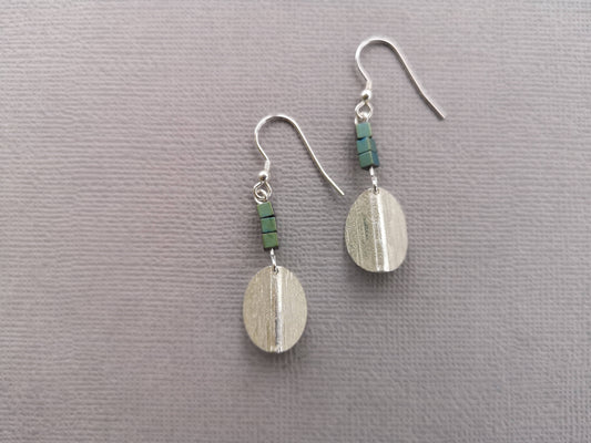 Textured drop earrings with teal hematite cubes