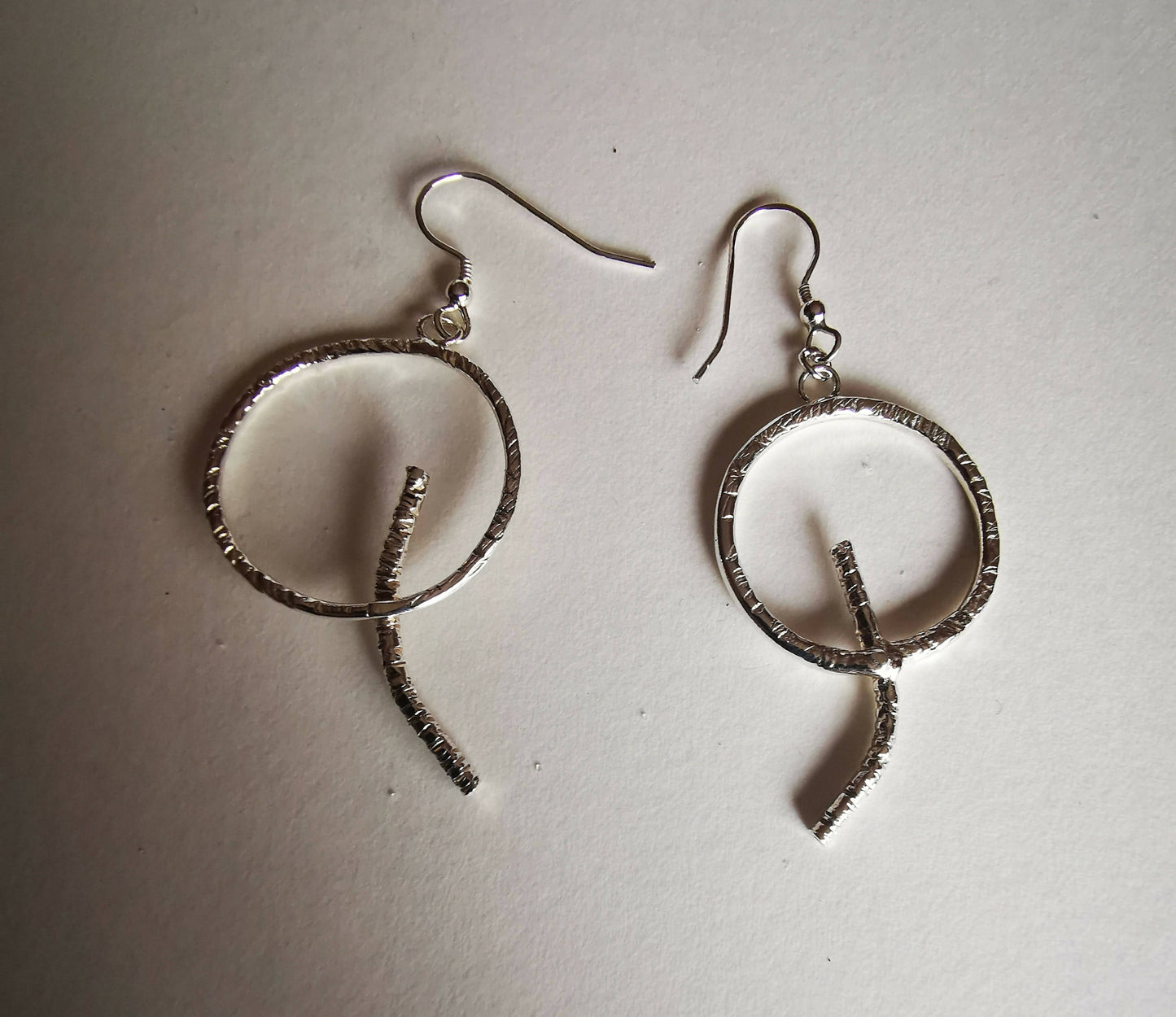 Contemporary silver dangly earrings