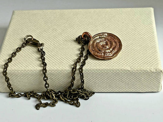 Yellow bronze spiral small pendant